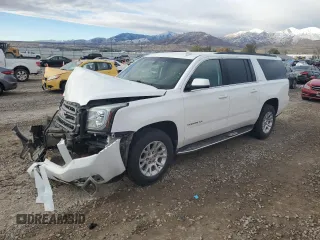 2015 GMC Yukon XL SLE with VIN 1GKS2GKC1FR735260, listed as a Copart auction lot 77422954 with 187,180 mi miles and Salvage Title. Bid and sale history available at carsss.com. Image 1.