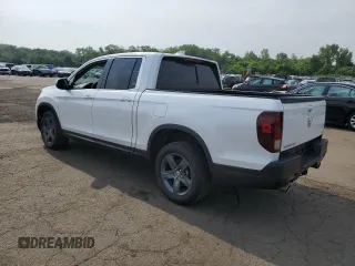 2023 Honda Ridgeline RTL with VIN 5FPYK3F53PB067003, listed as a Copart auction lot 58384895 with 31,983 mi miles and Salvage title. Bid and sale history available at DreamBid. Image 2.