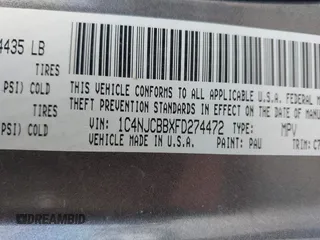 2015 Jeep Compass Sport with VIN 1C4NJCBBXFD274472, listed as a IAAI auction lot 41629585 with 124,407 mi miles. Bid and sale history available at carsss.com. Image 9.