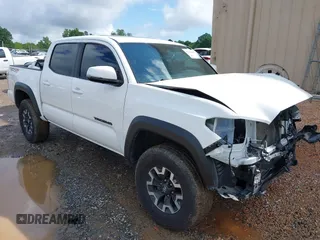 2023 Toyota Tacoma SR with VIN 3TMCZ5AN7PM639378, listed as a IAAI auction lot 42222407 with 38,172 mi miles and . Bid and sale history available at DreamBid. Image 1.