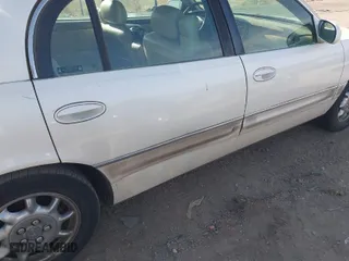 2002 Buick Park Avenue with VIN 1G4CW54K824124187, listed as a IAAI auction lot 41977431 with 182,092 mi miles. Bid and sale history available at carsss.com. Image 6.