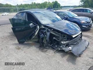 2024 Tesla Model Y Long Range z VIN 7SAYGDEE6RA218338, wystawiony jako IAAI lot #42253624 z przebiegiem 22 632 mil mil oraz . Historia ofert i sprzedaży dostępna na DreamBid. Obrazek 1.