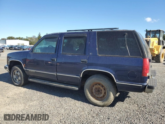 1999 GMC Yukon with VIN 1GKEK13R3XJ757466, listed as a Copart auction lot 75750884 with 270,768 mi miles and Salvage Title. Bid and sale history available at carsss.com. Image 2.