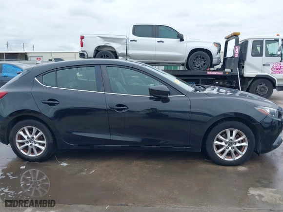 2016 Mazda Mazda3 i Grand Touring with VIN 3MZBM1N75GM267972, listed as a IAAI auction lot 41030060 with 86,065 mi miles. Bid and sale history available at carsss.com. Image 13.