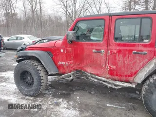 2018 Jeep Wrangler Unlimited Sport S with VIN 1C4HJXDG5JW131522, listed as a IAAI auction lot 41563099 with 75,405 mi miles and . Bid and sale history available at DreamBid. Image 6.
