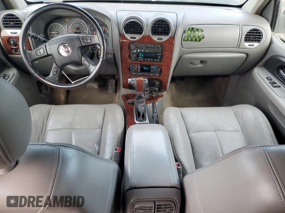 2005 GMC Envoy SLT with VIN 1GKDT13S552310799, listed as a Copart auction lot 43586125 with 182,928 mi miles and Salvage Title. Bid and sale history available at carsss.com. Image 8.