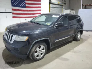 2011 Jeep Grand Cherokee Laredo z VIN 1J4RR4GG7BC506945, wystawiony jako Copart lot #53877985 z przebiegiem 109 479 mil mil oraz Szkoda całkowita • Salvage title. Historia ofert i sprzedaży dostępna na DreamBid. Obrazek 1.