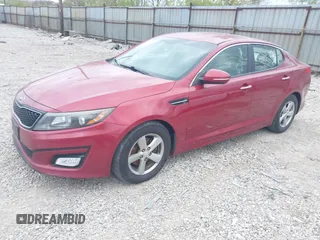 2015 Kia Optima LX with VIN 5XXGM4A7XFG446248, listed as a IAAI auction lot 42047807 with 167,000 mi miles. Bid and sale history available at carsss.com. Image 2.