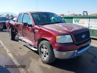 2005 Ford F-150 XLT with VIN 1FTPX12565NA45477, listed as a IAAI auction lot 41448417 with 145,039 mi miles. Bid and sale history available at carsss.com. Image 1.