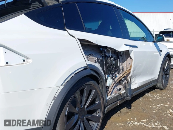 2022 Tesla Model X Plaid z VIN 7SAXCBE64NF352928, wystawiony jako IAAI lot #41406070 z przebiegiem 38 175 mil mil oraz . Historia ofert i sprzedaży dostępna na DreamBid. Obrazek 23.