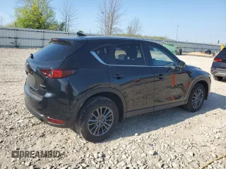 2021 Mazda CX-5 Touring z VIN JM3KFBCM5M0471172, wystawiony jako Copart lot #56646065 z przebiegiem 42 843 mil mil oraz Szkody całkowita. Historia ofert i sprzedaży dostępna na DreamBid. Obrazek 3.