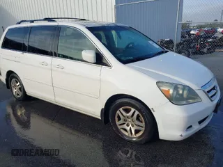 2005 Honda Odyssey EX-L with VIN 5FNRL38625B412583, listed as a IAAI auction lot 41842636 with 376,600 mi miles. Bid and sale history available at carsss.com. Image 1.