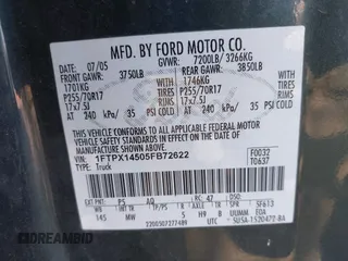 2005 Ford F-150 XLT with VIN 1FTPX14505FB72622, listed as a IAAI auction lot 41823532 with 165,918 mi miles. Bid and sale history available at carsss.com. Image 9.