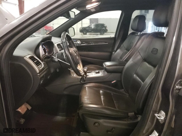 2014 Jeep Grand Cherokee Overland with VIN 1C4RJFCG6EC279248, listed as a Copart auction lot 49300895 with 165,248 mi miles and Salvage Title. Bid and sale history available at carsss.com. Image 7.