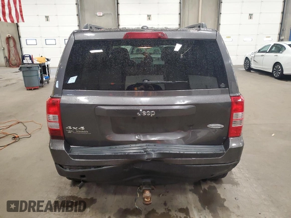 2016 Jeep Patriot High Altitude with VIN 1C4NJRFB5GD697474, listed as a Copart auction lot 57881215 with 152,127 mi miles and Salvage title. Bid and sale history available at DreamBid. Image 6.