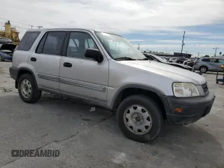 1999 Honda CR-V LX with VIN JHLRD2843XC011570, listed as a Copart auction lot 46330315 with 143,925 mi miles and Salvage Title. Bid and sale history available at carsss.com. Image 4.