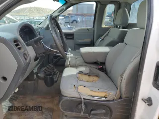2007 Ford F-150 XL with VIN 1FTRF12287KC42057, listed as a Copart auction lot 85299854 with 2,060,155 mi miles and Salvage title. Bid and sale history available at DreamBid. Image 7.