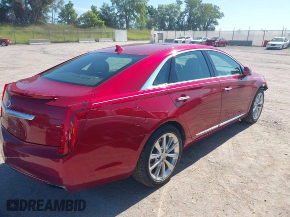 2014 Cadillac XTS Luxury with VIN 2G61M5S39E9143218, listed as a IAAI auction lot 42601268 with 37,172 mi miles and . Bid and sale history available at DreamBid. Image 4.
