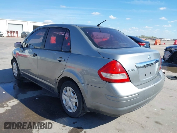 2010 Nissan Versa S with VIN 3N1BC1AP2AL394996, listed as a IAAI auction lot 40690760 with 125,972 mi miles and . Bid and sale history available at DreamBid. Image 3.