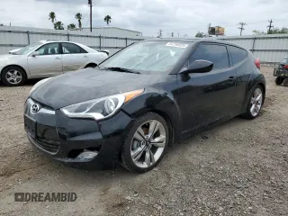 2014 Hyundai Veloster z VIN KMHTC6AD0EU188863, wystawiony jako Copart lot #54750925 z przebiegiem 96 212 mil mil oraz Szkoda całkowita • Salvage title. Historia ofert i sprzedaży dostępna na DreamBid. Obrazek 1.