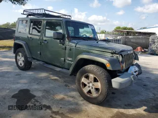 2008 Jeep Wrangler Unlimited Sahara with VIN 1J4GA59198L566019, listed as a Copart auction lot 53975965 with 184,612 mi miles and Salvage Title. Bid and sale history available at carsss.com. Image 4.