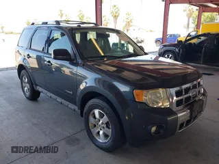2009 Ford Escape Hybrid z VIN 1FMCU49319KA37562, wystawiony jako IAAI lot #42530003 z przebiegiem 153 769 mil mil oraz . Historia ofert i sprzedaży dostępna na DreamBid. Obrazek 1.