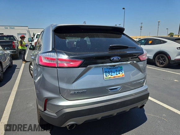 2020 Ford Edge Titanium with VIN 2FMPK4K92LBA30658, listed as a IAAI auction lot 42848998 with 63,460 mi miles and . Bid and sale history available at DreamBid. Image 12.