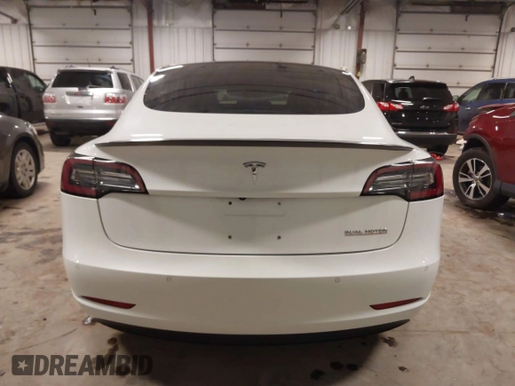 2018 Tesla Model 3 Long Range Battery with VIN 5YJ3E1EB5JF084446, listed as a IAAI auction lot 41209852 with 70,125 mi miles and . Bid and sale history available at DreamBid. Image 17.