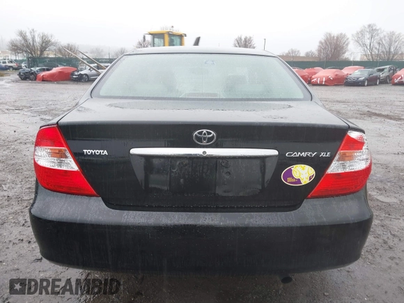 2003 Toyota Camry LE with VIN 4T1BE30K13U144114, listed as a IAAI auction lot 41829879 with 60,385 mi miles and . Bid and sale history available at DreamBid. Image 16.