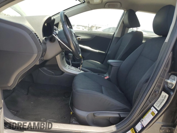 2010 Toyota Corolla with VIN 1NXBU4EEXAZ354803, listed as a Copart auction lot 61013865 with 223,171 mi miles and Salvage title. Bid and sale history available at DreamBid. Image 7.