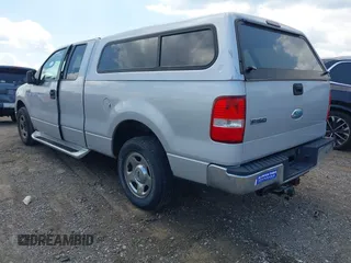 2006 Ford F-150 STX with VIN 1FTRX12W36NA43060, listed as a IAAI auction lot 42656298 with 183,309 mi miles and . Bid and sale history available at DreamBid. Image 3.