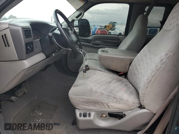 1999 Ford F-250 XL with VIN 1FTNX20L3XEB76271, listed as a Copart auction lot 43633095 with 166,947 mi miles and Salvage title. Bid and sale history available at DreamBid. Image 7.