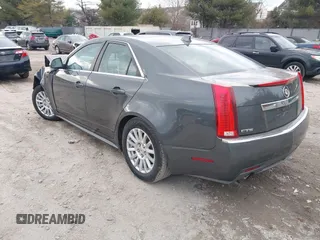 2012 Cadillac CTS Luxury z VIN 1G6DE5E51C0112608, wystawiony jako IAAI lot #41656992 z przebiegiem Nie podano mil oraz . Historia ofert i sprzedaży dostępna na DreamBid. Obrazek 3.