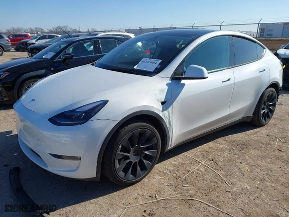 2023 Tesla Model Y Long Range with VIN 7SAYGAEEXPF598086, listed as a IAAI auction lot 41125984 with NaN miles. Bid and sale history available at carsss.com. Image 2.