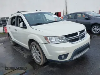 2015 Dodge Journey R/T z VIN 3C4PDDFG1FT701415, wystawiony jako IAAI lot #41129414 z przebiegiem 129 061 mil mil oraz . Historia ofert i sprzedaży dostępna na DreamBid. Obrazek 1.