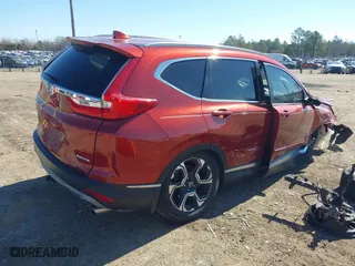 2019 Honda CR-V Touring with VIN 2HKRW1H9XKH500025, listed as a IAAI auction lot 41667564 with 73,889 mi miles. Bid and sale history available at carsss.com. Image 4.