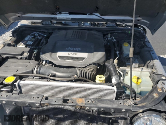 2015 Jeep Wrangler Unlimited Rubicon Hard Rock with VIN 1C4HJWFG2FL686556, listed as a Copart auction lot 54049955 with 126,675 mi miles and Salvage title. Bid and sale history available at DreamBid. Image 12.