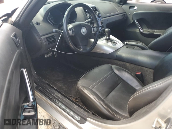 2009 Saturn Sky z VIN 1G8MN35B69Y101096, wystawiony jako Copart lot #68100674 z przebiegiem 37 005 mil mil oraz Czysty tytuł • Clean title. Historia ofert i sprzedaży dostępna na DreamBid. Obrazek 8.