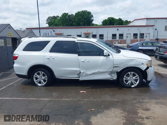 2013 Dodge Durango SXT z VIN 1C4RDHAG9DC530204, wystawiony jako IAAI lot #42128529 z przebiegiem 233 539 mil mil oraz . Historia ofert i sprzedaży dostępna na DreamBid. Obrazek 13.