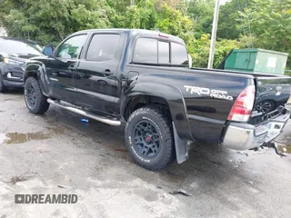 2014 Toyota Tacoma with VIN 5TFLU4EN5EX101434, listed as a IAAI auction lot 42273927 with 216,394 mi miles and . Bid and sale history available at DreamBid. Image 3.