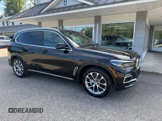 2019 BMW X5 xDrive40i with VIN 5UXCR6C56KLL22798, listed as a Copart auction lot 63142955 with 167,534 mi miles and Clean title. Bid and sale history available at DreamBid. Image 1.