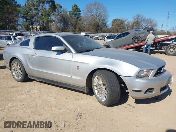 2012 Ford Mustang V6 Premium with VIN 1ZVBP8AM1C5224001, listed as a IAAI auction lot 41385559 with 165,123 mi miles. Bid and sale history available at carsss.com. Image 1.