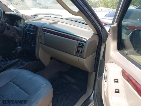 2002 Jeep Grand Cherokee Limited with VIN 1J8GW58S62C253818, listed as a IAAI auction lot 41983592 with 165,378 mi miles. Bid and sale history available at carsss.com. Image 5.