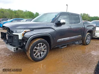 2022 Toyota Tundra 2WD 1794 Edition with VIN 5TFMA5AB1NX006173, listed as a IAAI auction lot 41880463 with 48,923 mi miles. Bid and sale history available at carsss.com. Image 2.