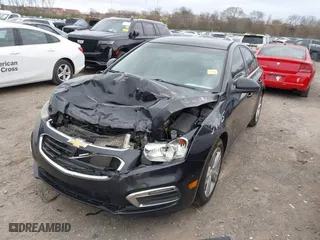 2015 Chevrolet Cruze LT with VIN 1G1PE5SB5F7237605, listed as a IAAI auction lot 41802293 with 207,051 mi miles. Bid and sale history available at carsss.com. Image 2.