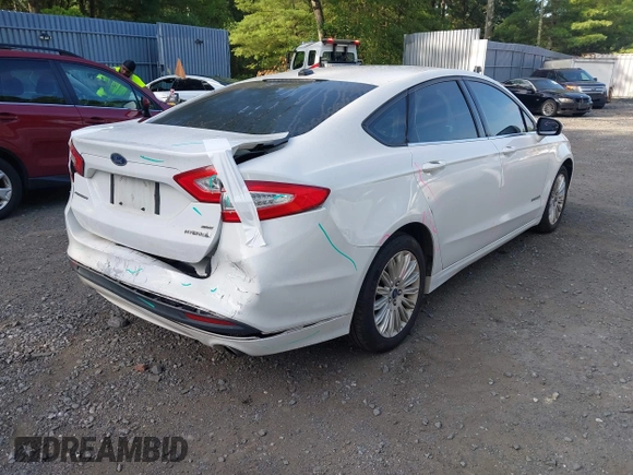 2013 Ford Fusion SE Hybrid with VIN 3FA6P0LUXDR349019, listed as a IAAI auction lot 42800125 with 143,089 mi miles and . Bid and sale history available at DreamBid. Image 4.