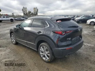 2022 Mazda CX-30 S Premium with VIN 3MVDMBDL7NM443738, listed as a Copart auction lot 48970255 with 20,675 mi miles and Salvage Title. Bid and sale history available at carsss.com. Image 2.