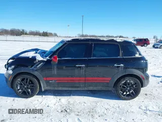 2011 MINI Countryman S with VIN WMWZC5C50BWL55234, listed as a IAAI auction lot 41323339 with 134,709 mi miles and . Bid and sale history available at DreamBid. Image 15.