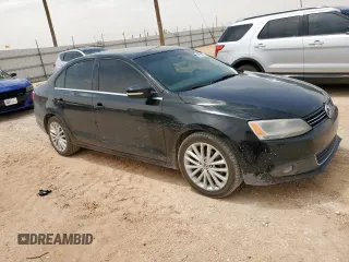 2014 Volkswagen Jetta TDI w/Premium with VIN 3VW3L7AJ2EM443384, listed as a Copart auction lot 56748125 with 137,987 mi miles and Salvage title. Bid and sale history available at DreamBid. Image 4.