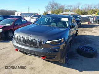 2022 Jeep Cherokee Trailhawk with VIN 1C4PJMBX9ND522235, listed as a IAAI auction lot 41738257 with 24,911 mi miles and . Bid and sale history available at DreamBid. Image 18.